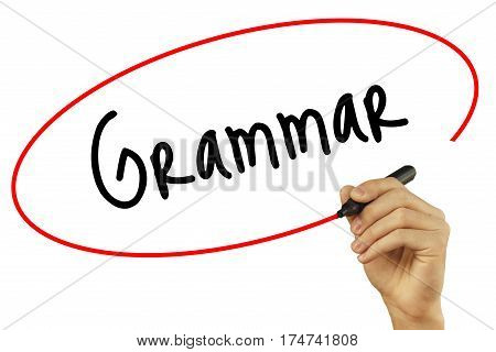 Man Hand Writing Grammar With Black Marker On Visual Screen. Isolated On Background. Business, Techn