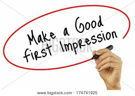 Man Hand Writing Make A Good First Impression With Black Marker On Visual Screen. Isolated On Backgr