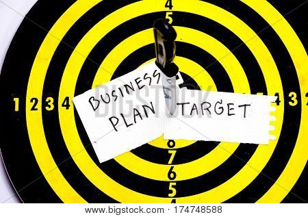 Cogent of business, knife on target dart board, copy space background
