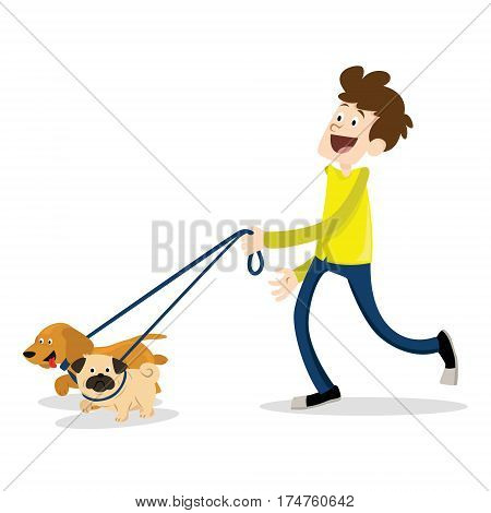 A young man walks with two dogs on a white background
