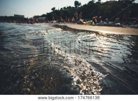 Oceanic water tide on seashore. Ocean Wave.