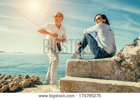 Romantic date with wine in the sea lagune.