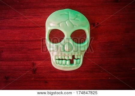 decoration phosphoric scull on red wood background