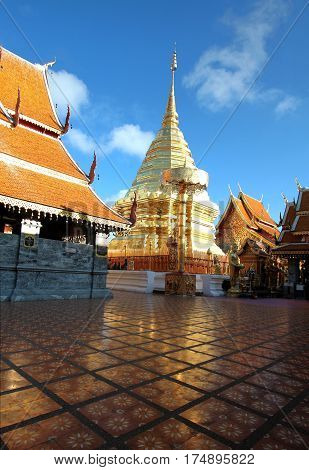 Golden pagoda against clear blue sky at Wat Phra That Doi Suthep A famous Theravada buddhist temple at Chiang Mai Thailand