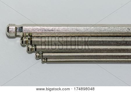 Hex key Set on white background.A hex key, Allen key or Allen wrench is a tool used to drive bolts and screws with hexagonal sockets in their heads.