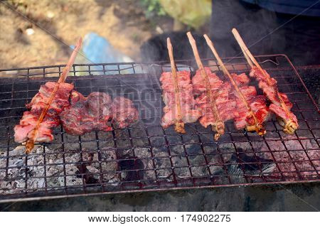 Pork Roasted And Entrails Of Pig Grilled For Sale On Old Stove