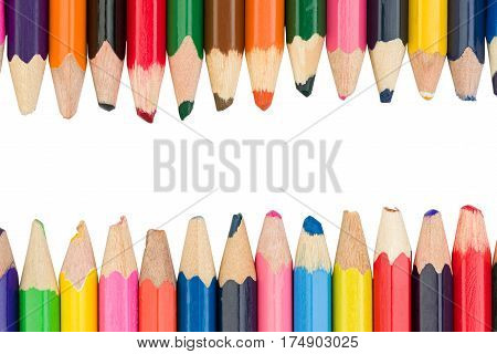Two rows of colored pencils on top and bottom in the middle you can write the text