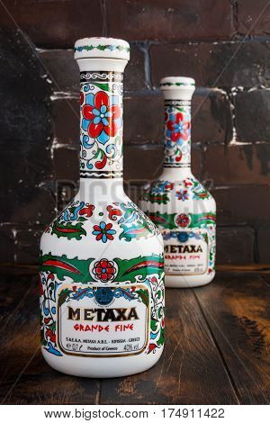 MOSCOW RF - FEBRUARY 7 2017: Bottles of Metaxa Grande Fine on a wooden table.