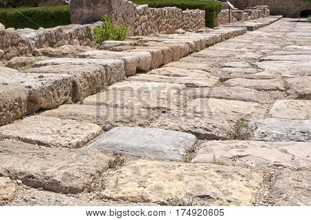 Close up of ancient roman road ruins in Tarraco forum (Tarragona Catalonia Spain Europe)