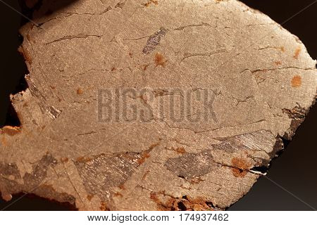 Macro photo of an iron meteorite with Widmanstaetten patterns.