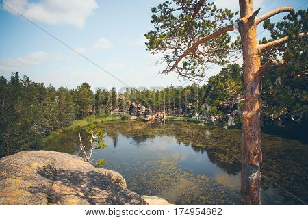 Mountain lake in the background of mountains and blye sky