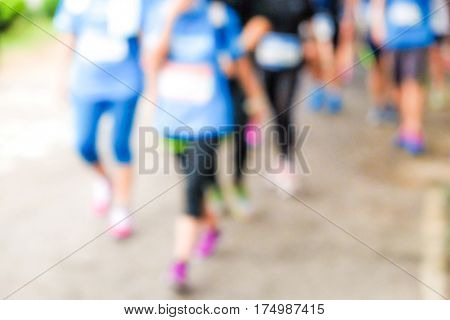 Blurred Marathonrunning Race People Competing In Park