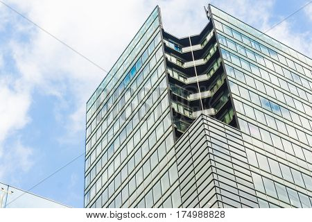 Commercial Tower Building Window With Blue Sky