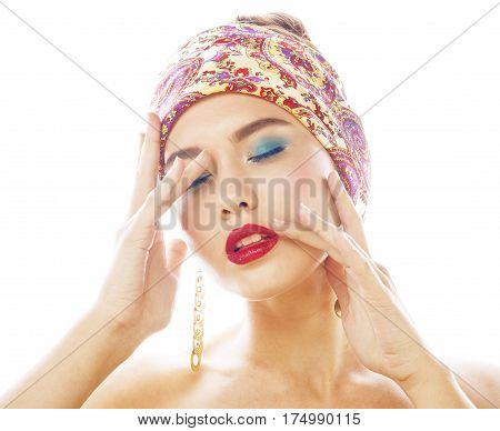 young pretty modern girl with bright shawl on head emotional posing isolated on white background, asian people ethnicity close up