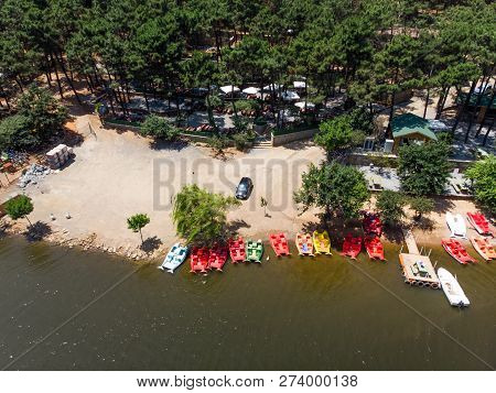 Aerial Drone View Of Aydos Forest Lake With Summer Pedalo Boats In Istanbul. Natural Life