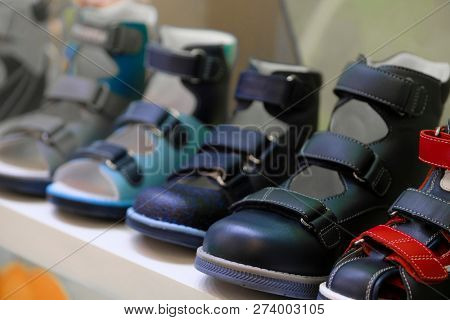 Row of the child shoes in a shop