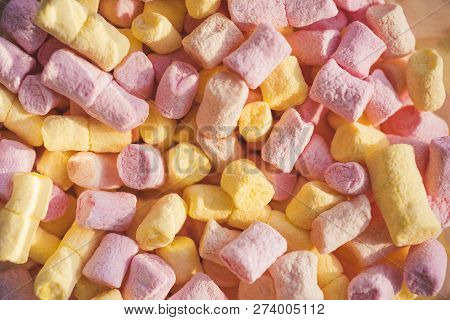 Sweet And Gummy. Colorful Mini Marshmallow Background Or Texture. Unhealthy Junk Food. Marshmallow S