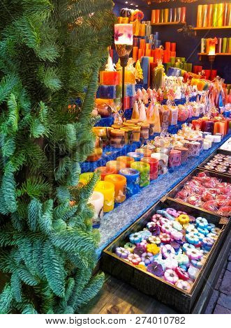 Candy, Toys And Candles At The Christmas Market