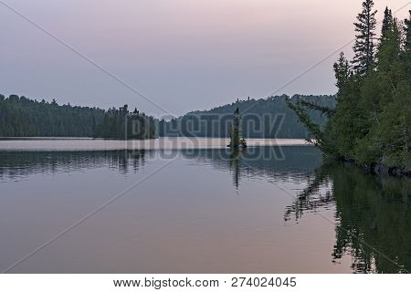 Calm Waters At Twilight In The North Woods On Other Man Lake In Quetico Provincial Park In Ontario
