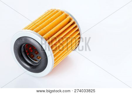 Car Paper Filter Assy-oil  On A White Background Casts A Shadow With Empty Copy Space For Text, Clos