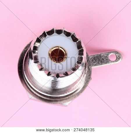 Radio Connector On Pink Background At Dry Sunny Summer Day