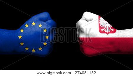 Concept Of Relations/conflict Between Poland And The European Union Symbolised By Two Opossed Clench