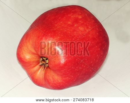 Ripe Apple In Close-up On A White Background