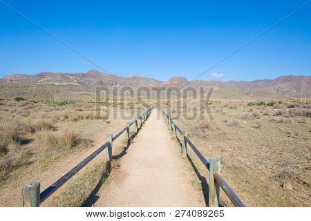 Footpath Between Wooden Banisters To Protect Nature Of Cabo De Gata Natural Park In Almeria