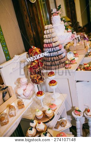 Candy Bar With Balls, Macaroon On Candy Bar, Candy Bar On Holiday, Candy Bar At The Wedding. Dessert