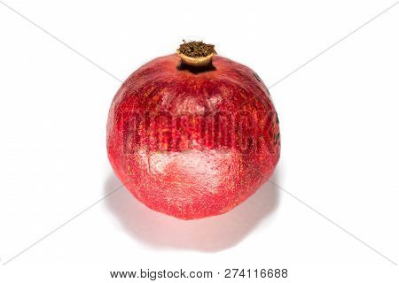 Royal Red Pomegranate On A White Background. View From Above.