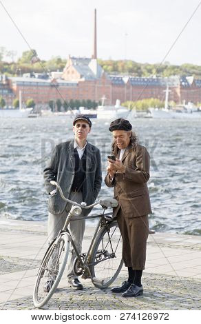 Stockholm - Sept 22, 2018: Gtwo Men Wearing Old Fashioned Tweed Clothes Preparing For The Bike In Tw