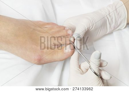 Process Of Pedicure At Beauty Salon Close Up