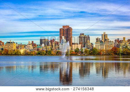 New York, New York at Central Park and reservoir in autumn season. 