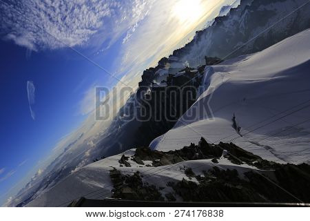Beautiful dawn light from above Aguille du Midi, Chamonix