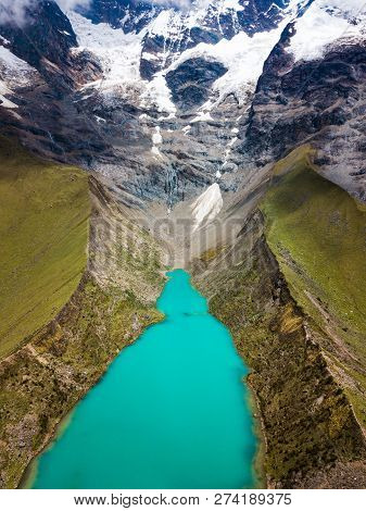 Aerial View Of Humantay Lake In Peru On Salcantay Mountain In The Andes