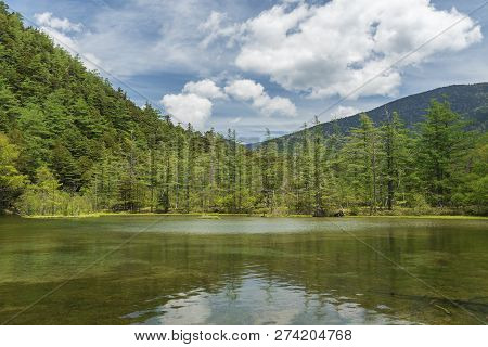 Idyllic Landscape Of Myojin Pond At Hotaka Rear Shrine In Kamikochi, Nagano, Japan