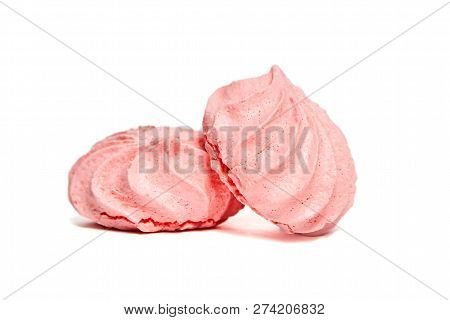 Two Meringue Cookies. Meringues Kisses In Pink Color. Airy And Practically Weightless Biscuits Based