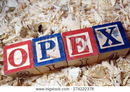 Text Arranged Using Wooden Block As Opex