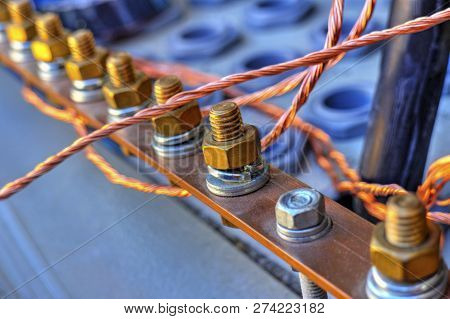 Grounding Bus With Terminals And Wires Inside Of Electrical Control Cubicle