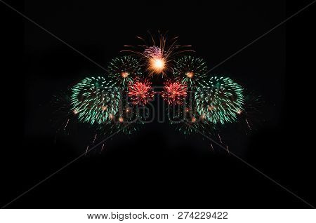 Colorful Fireworks Abstract Background In The Dark Sky With Copy Spacce For Festival Celebration Hol