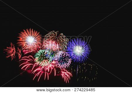 Colorful Fireworks Abstract Background In The Dark Sky With Copy Spacce For Festival Celebration Hol