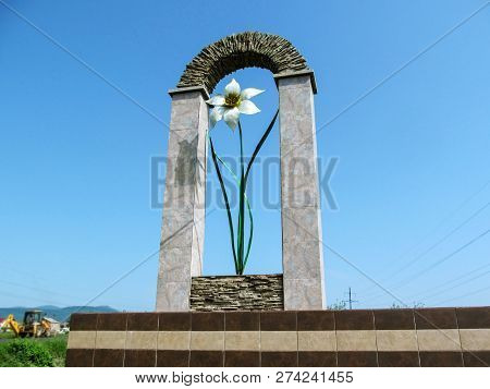 Ukraine, Khust - May 1, 2018: Large Sculpture Of White Narcissus - A Symbol Of The Valley Of Narciss
