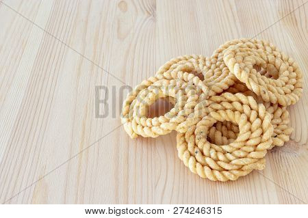 Chakli Or Murukku Popular Vegetarian Snack South India. Spiral Shaped Crisp Deep-fried Snack. Close