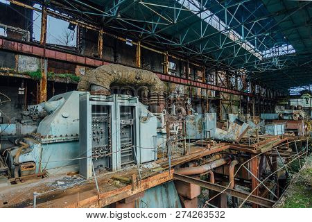 Abandoned, Destroyed By War And Overgrown By Plants And Moss Machinery Of Tkvarcheli (tquarchal) Pow