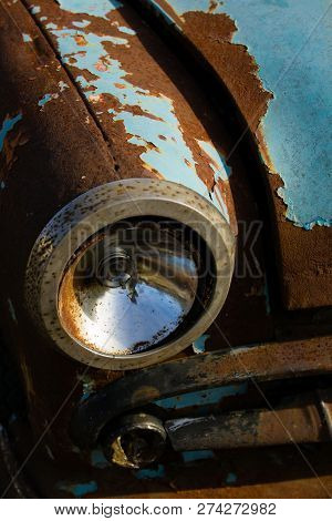Old, Rusty Car Wreck Front And Lamp Detail