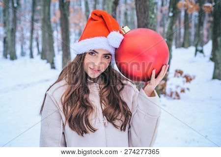 Winter Woman Happy. Winter Portrait Of Young Woman In The Winter Snowy Scenery. What Happens During 