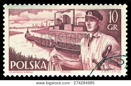 Stavropol, Russia - December 16, 2018: A Stamp Printed By Poland, Shows  Docker, Tow And Barge, Circ