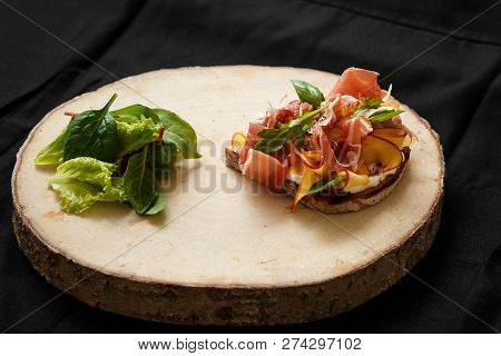 Sandwich With Jamon And Lettuce On A Wooden Tray. Top View Of Grilled Jamon Sandwich For A Quick Sna