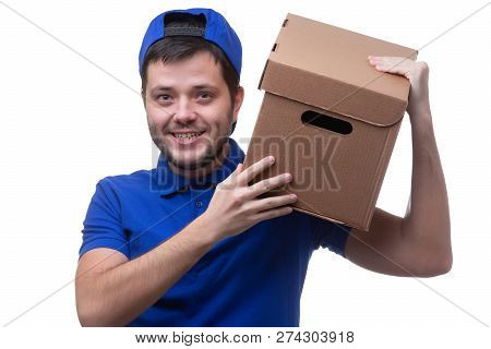 Photo Of Man In Blue T-shirt And Baseball Cap With Cardboard Box On White Background
