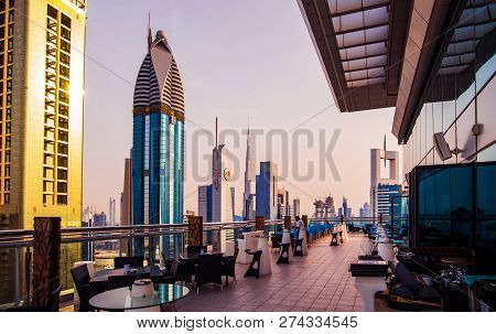 Dubai, United Arab Emirates - April 3, 2018: Modern Skyscrapers Of Downtown Dubai From A Rooftop Cof